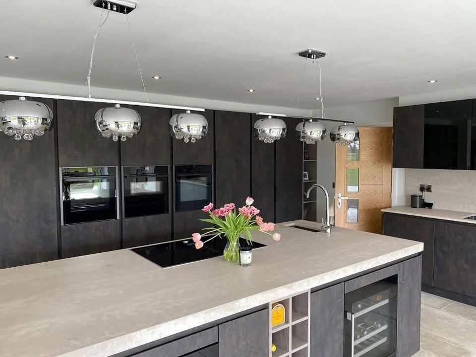 High-end kitchen island and ovens after a clean